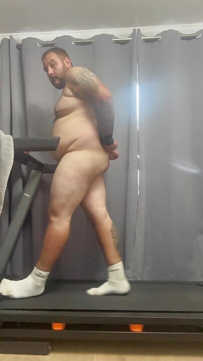 Cock and balls tied to treadmill with nipple clamps and hands cuffed