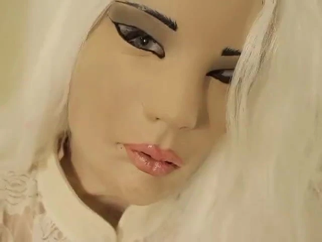 female mask masturbating her pussy
