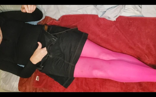 Sexy crossdresser teasing in bed.