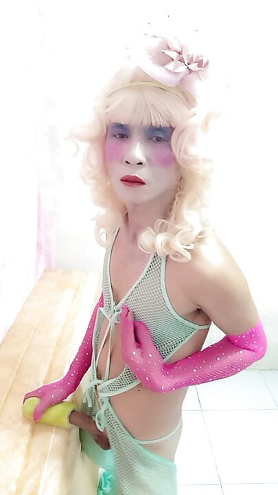 Oanh Le transgender wearing sexy clothes porn playing with an artificial can