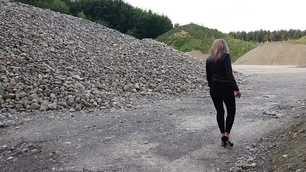 Grandma Is Walking Around a Gravel Pit in Tight Leggings and High Heels!