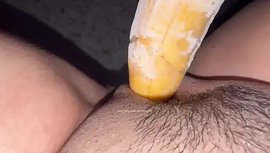 Trying for the first time young girl with cucumber