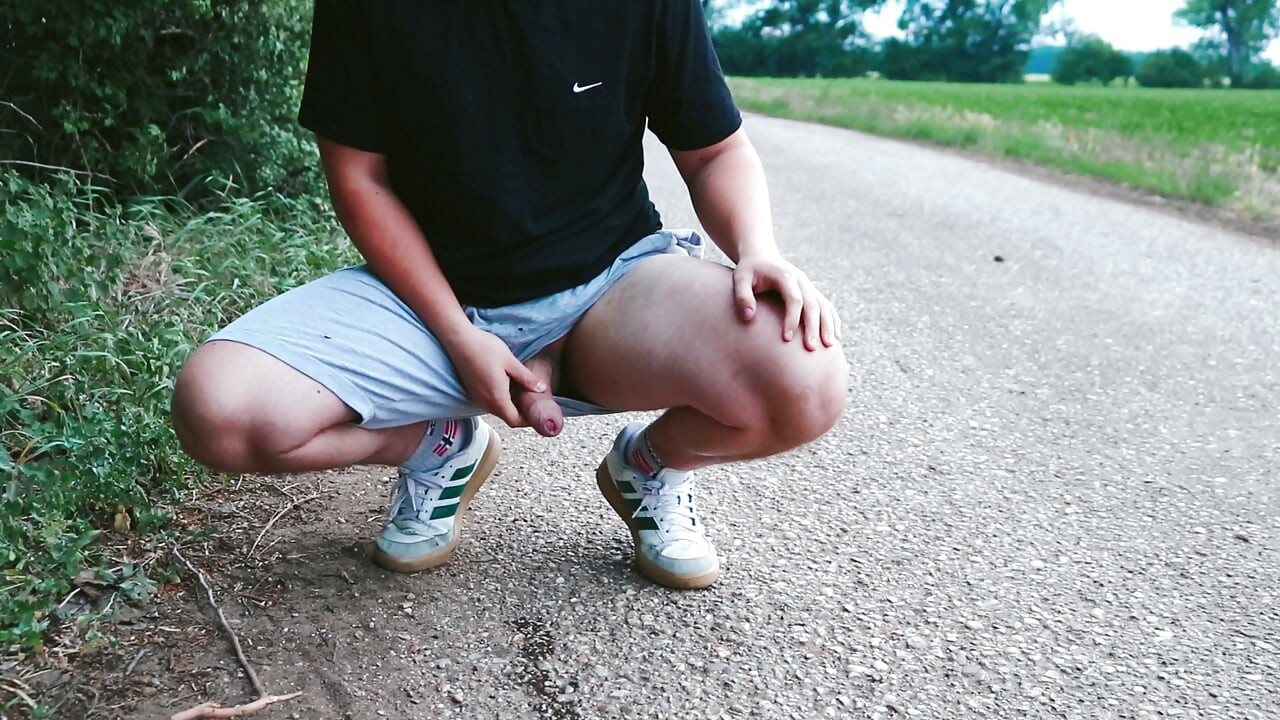 Pissing with a bare cock in nature