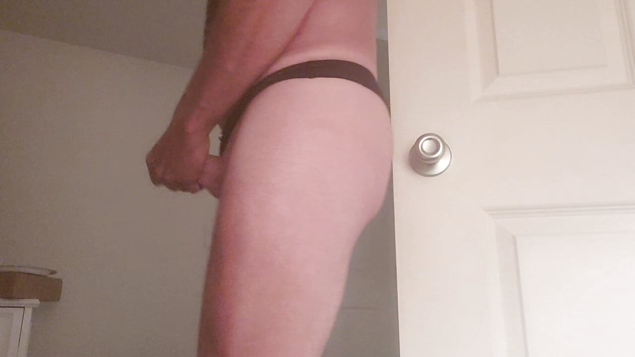 Anal play in my black satin thong.