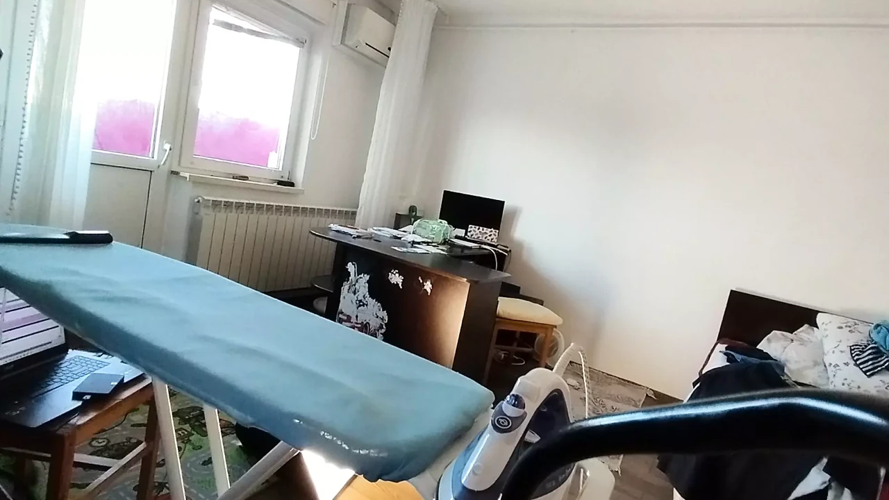 Amateur woman doing housework naked Sexy and naughty wife trying on clothes she cuts.