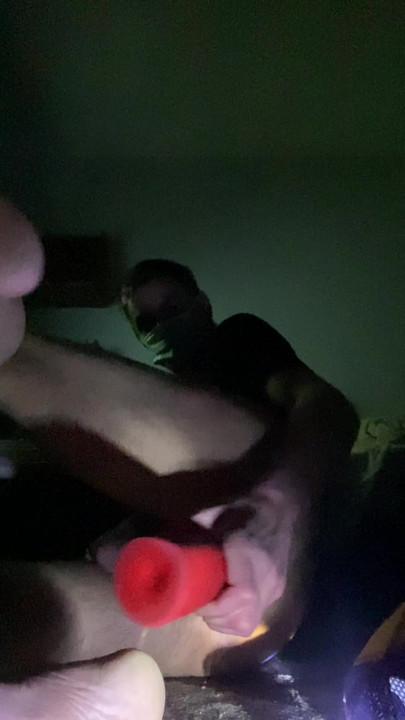 A dildo hand in the ass surprises itself