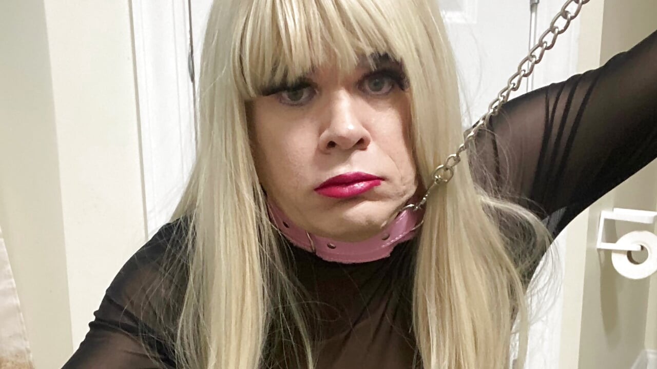 Slutty blonde whore CD Madison crossdressing while being chained for bdsm bondage