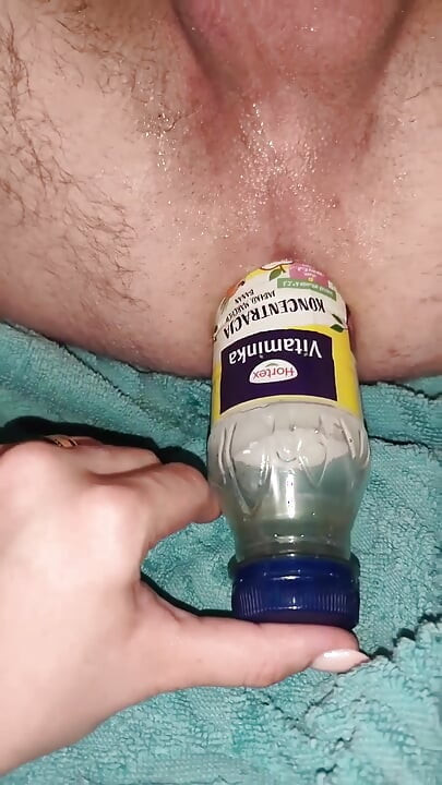 I fuck my husband with a bottle and a big black cock.
