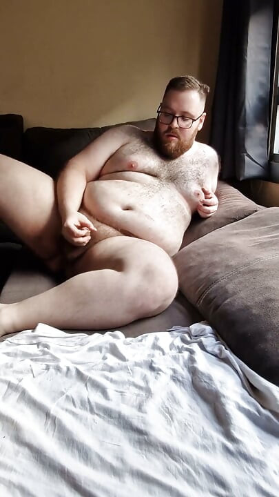Fat Hairy Jerks off While Watching Porn