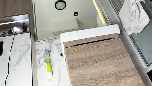 Big tits big ass hot sexy beauty in the bathroom with the short pink skirt shows her braless boobs and long legs