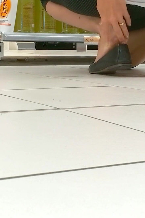 Footplay and Dipping in Black Flats at a Conad Store
