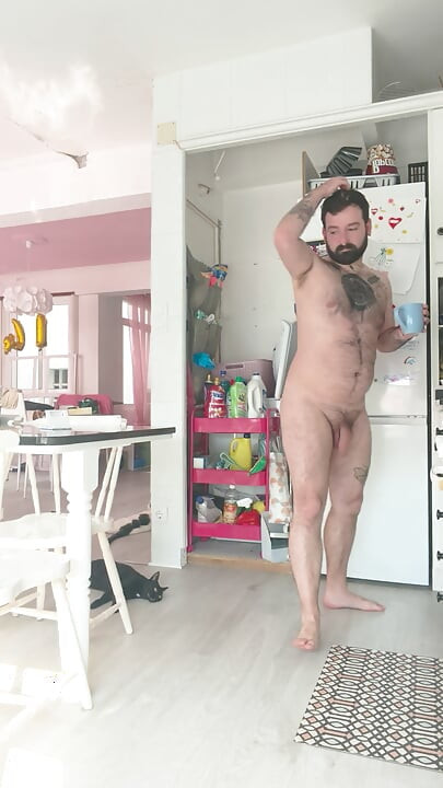 Walking around the house naked and masturbating