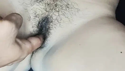 Fingers inserted into pink tight