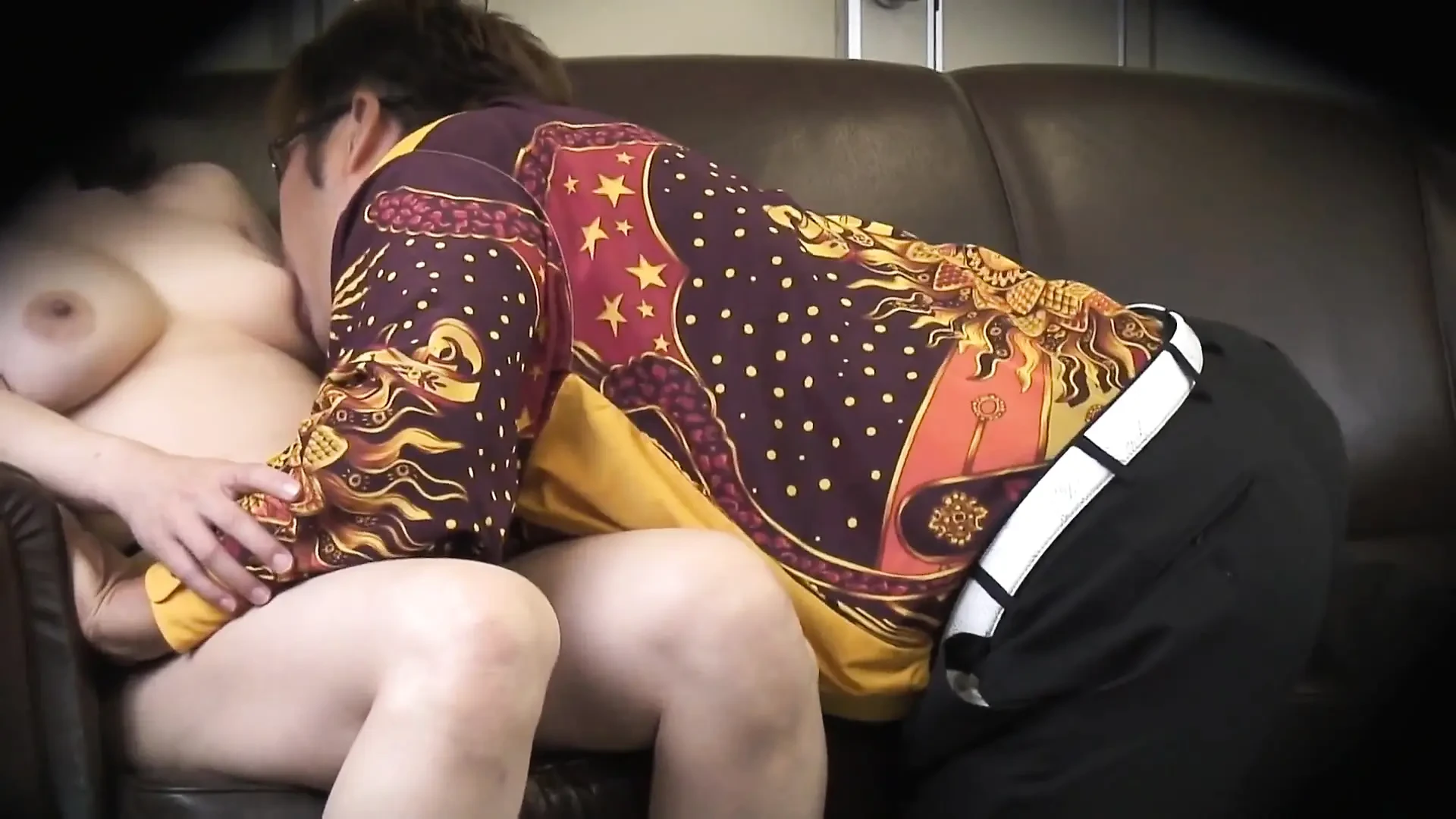 Mature Japanese lady moans while riding on a hard prick