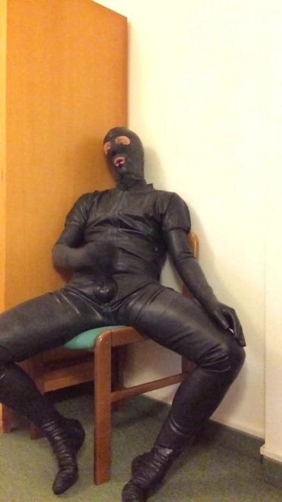 Masturbating in rubber catsuit