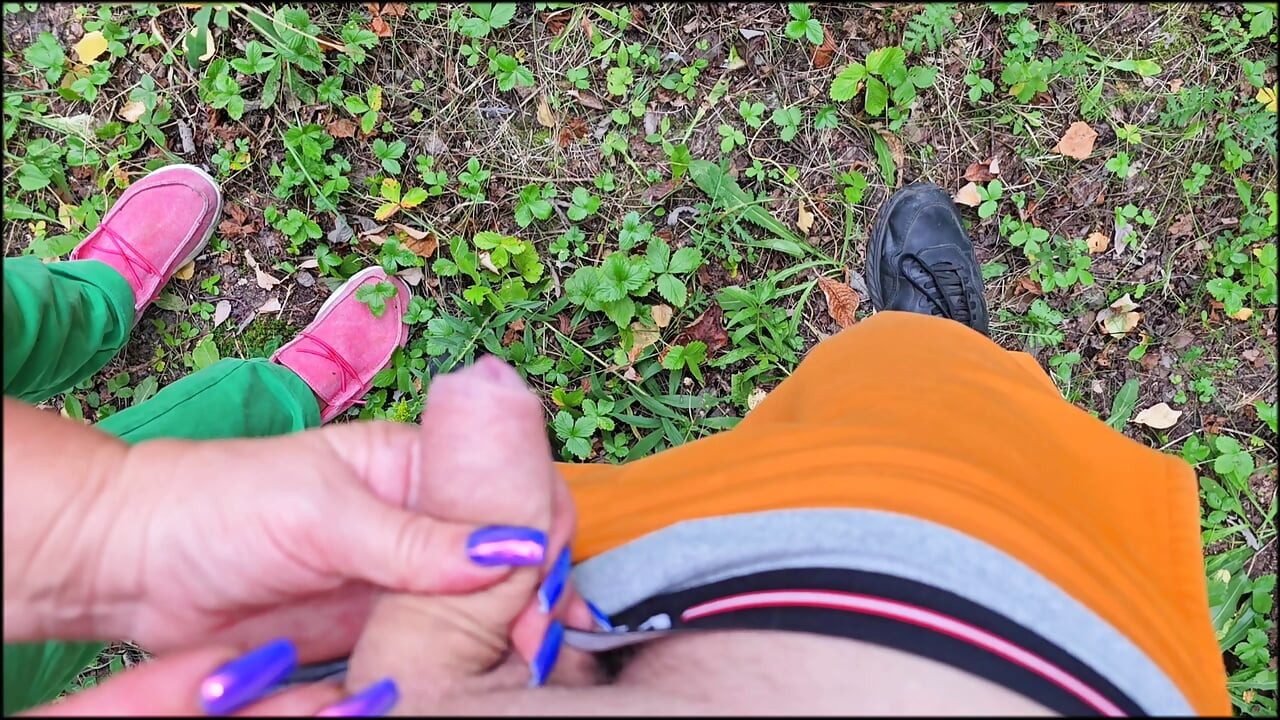 The stepmother holds her stepson's cock while he pees on her hand