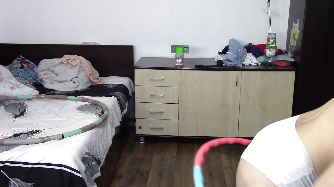 Sexy wife trains naked at home. Sexy brunette tries on stockings, hairy pussy, big ass, big tits.