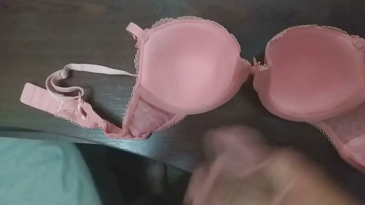 Playing with a coral bra