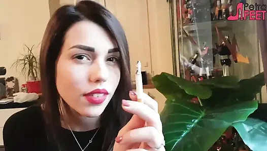 Smoking in close up with a beautiful girl