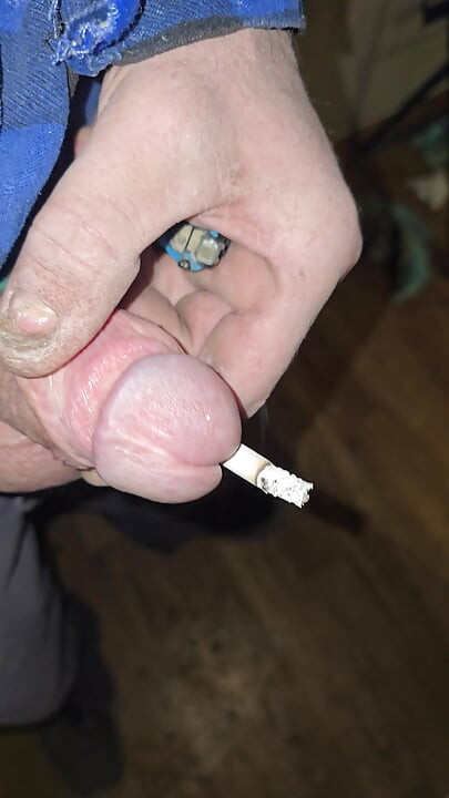 Smoking a cigarette with a dick