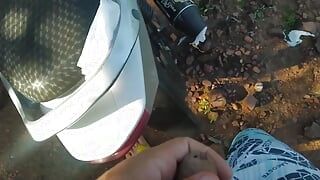 Boy fucks motorcycle with his little cock in the middle of the woods.