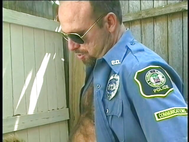 Muscular man in uniform and wearing glasses sucks and blows his colleague's hot cock
