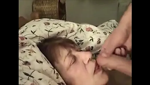 Granny lying on the couch get sperm in mouth