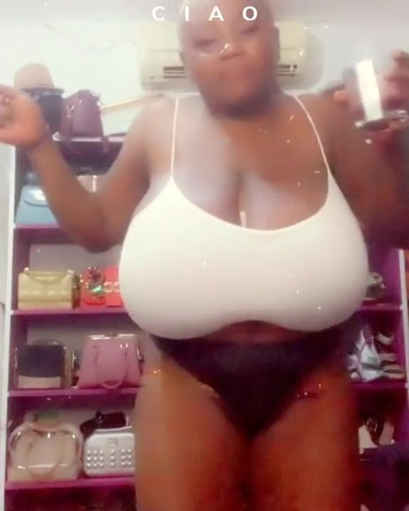 African Woman With Huge Boobs Teasing