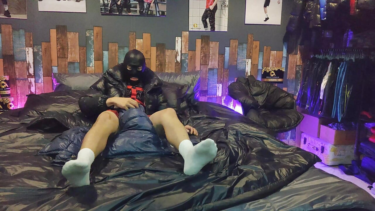 Cock Rubbing Down Jacket on Shiny Nylon Bed