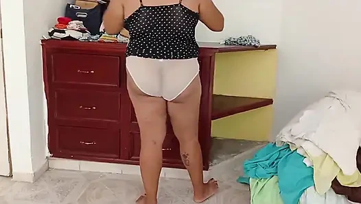 Chubby Girl Tidying the Room and Folding Clothes
