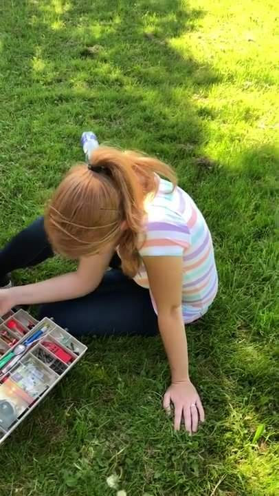 Sexy redhead fishing