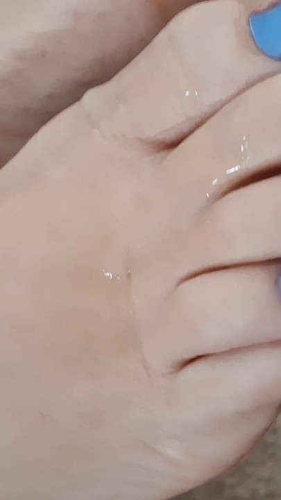 Jerking off and cumshot on her cute feet and toes | Clip 2