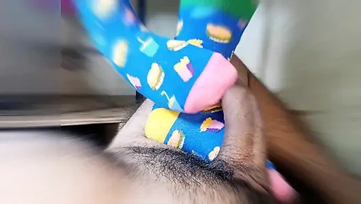 straw with feet wearing very funny stockings