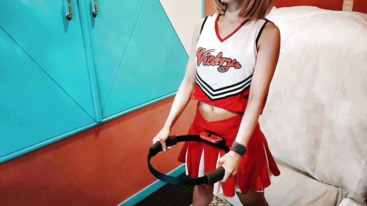 A cute busty married woman exercises 2 in a sexy cheerleader costume. Home made amateur Private Shoot