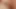 Close-up oiled shaved smooth erect penis and balls being masturbated slowly.