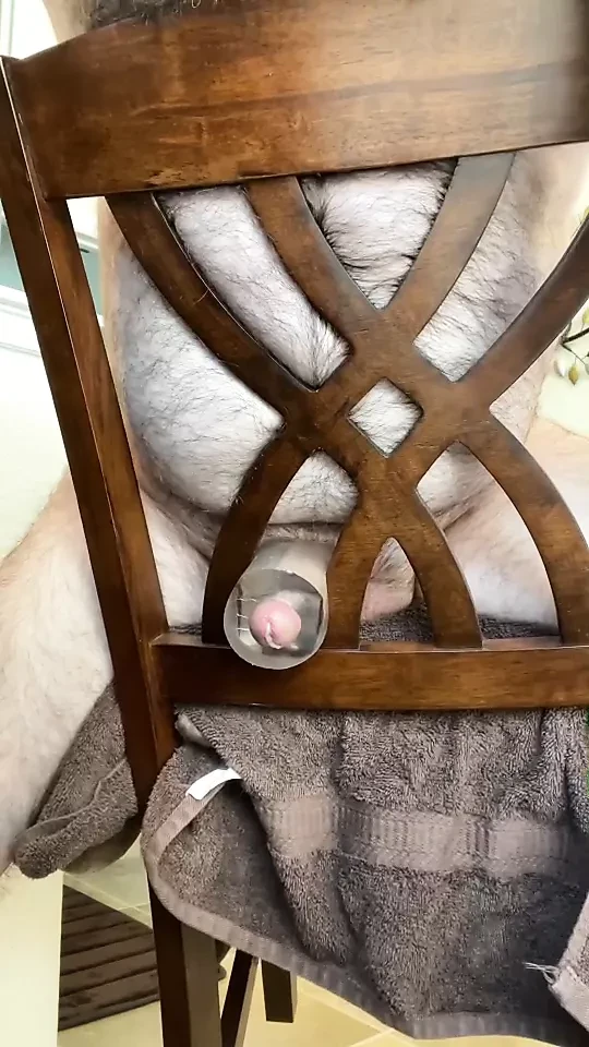 Cumshot fucking toy through chair