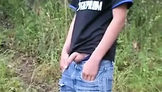 boy piss in the forest