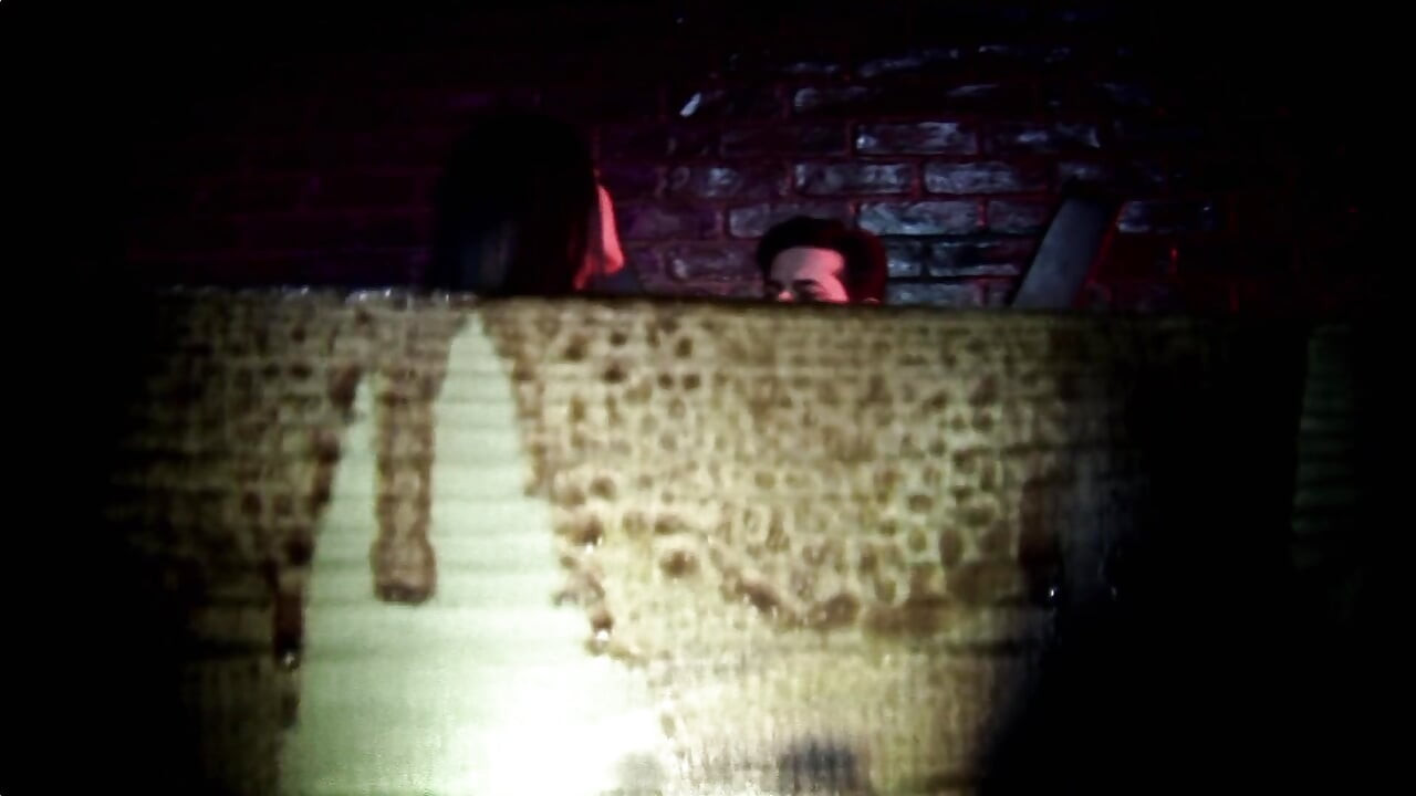 Busty milf in leather and fishnets seduces man in the dungeon