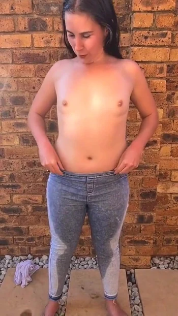 Powerful moment from "Brunettes outdoor piss, soaking clothes in piss, pants wetting"