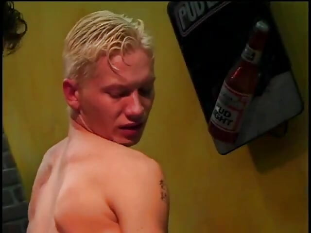 Blonde boy gets his tight ass fucked hard by a manly dude in a bar