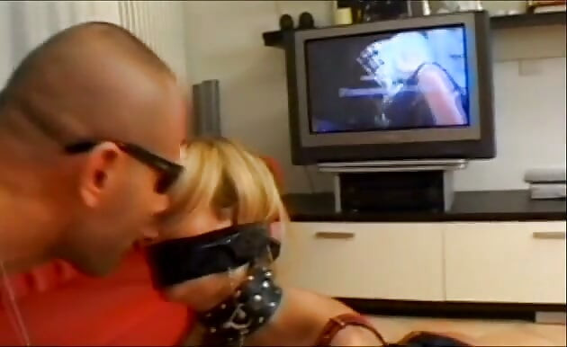 Dude uses his sex slave girl dressed in leather for his pleasure