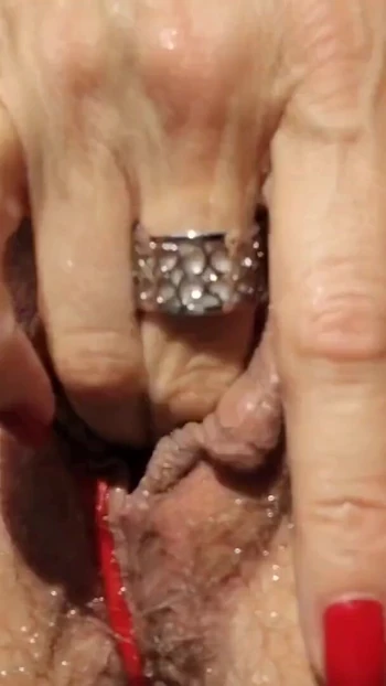 Epic moment from "Close-up hot milf munichgold mastrobates in red panties on her balcony with sexy NS squirt please lick me"