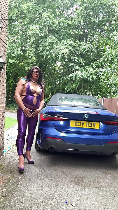 Sexy Crossdresser kellycd2022 in purple pvc catsuit and heels