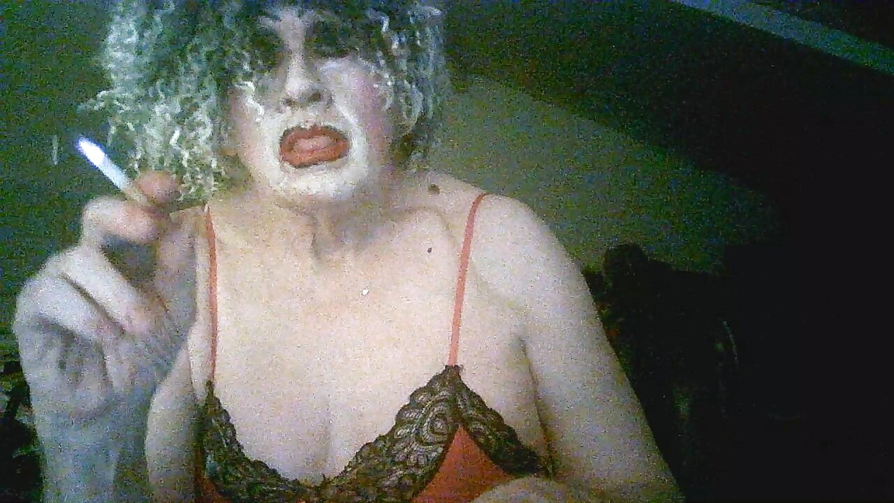 Sarah shitcunt Millward smokes and  flaunts herself for custom, like the whore she is
