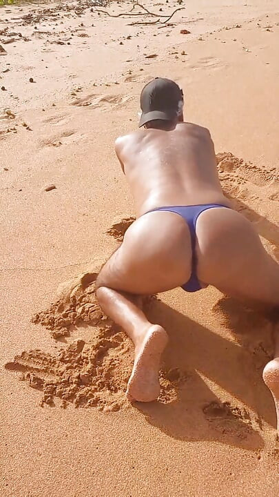 Ladysilva on the beach showing off her hot ass in bikini