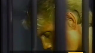 Muscular policeman fucks prisoner in his ass