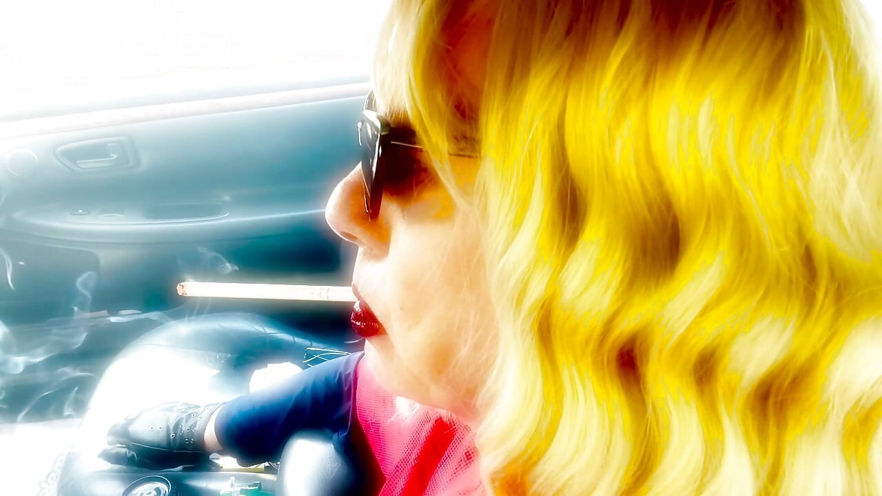 MATURE BLONDE SMOKING VS120 MENTHOLS WITH CAT SUNGLASSES