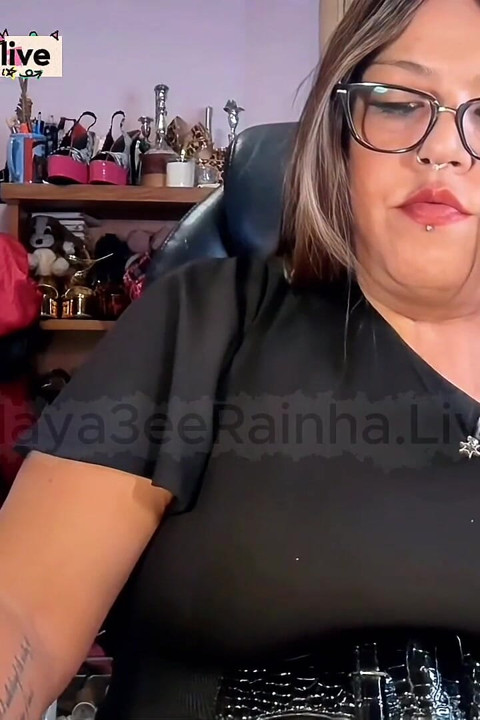 Brazilian BBW MILF Goddess Green Eyes Red Lips Red Nails Chain Smoking Ignoring You
