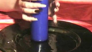 Long nails scratching candle