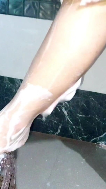 Jaw-dropping moment from "Desi hot boudi shaving her pussy and taking bath"